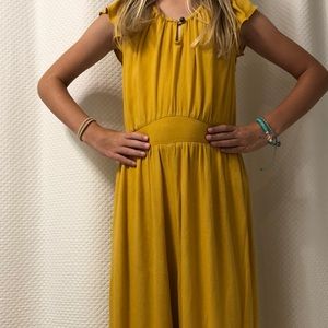 Yellow OLD NAVY. Romper! Lightly used. Flowy and stretchy. Size M (8)
